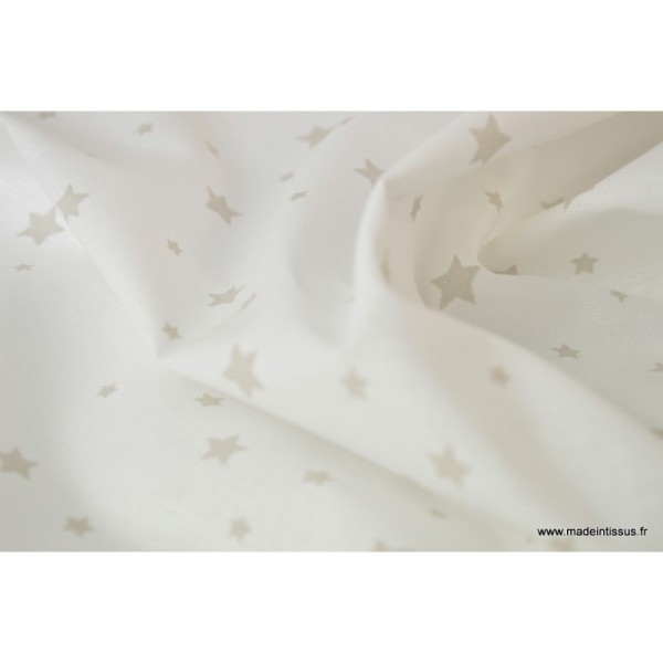 Tissu Coton imprimé étoiles beige fond blanc - Photo n°4