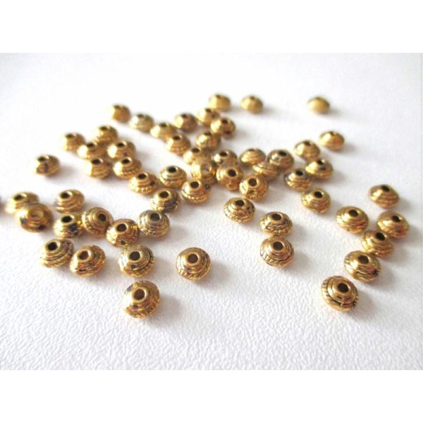 Lot de 20 perles métal toupie plate dorée - Photo n°1