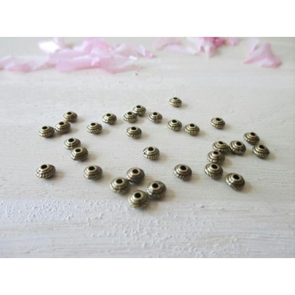 Lot de 20 perles métal toupie plate bronze - Photo n°1