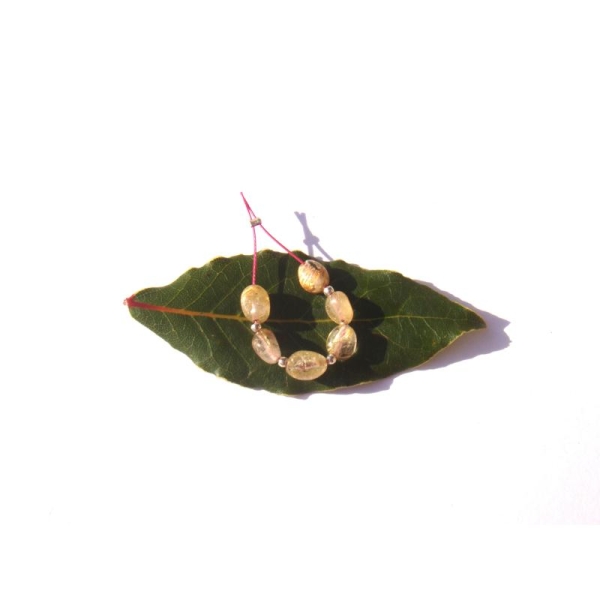 Quartz Rutiles Dorées : 6 petites perles ovales irrégulières 7/8 MM de longueur - Photo n°2