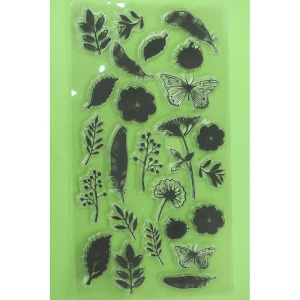25 Tampons en silicone transparent  motifs :  feuiles , plumes , papillon - Photo n°1