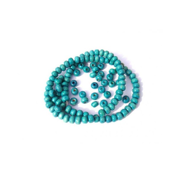 50 Perles irrégulières en bois teinté Turquoise 5 MM x 6 MM de diamètre - Photo n°1