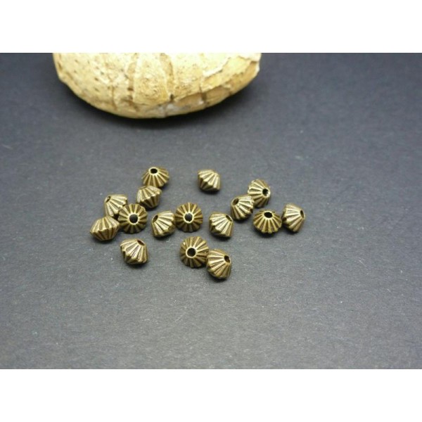25 Perles En Métal Toupie 5*4Mm Bronze - Photo n°1