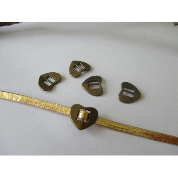 Lot de 10 perles passantes cœur bronze pour cordon 5 mm - Photo n°1