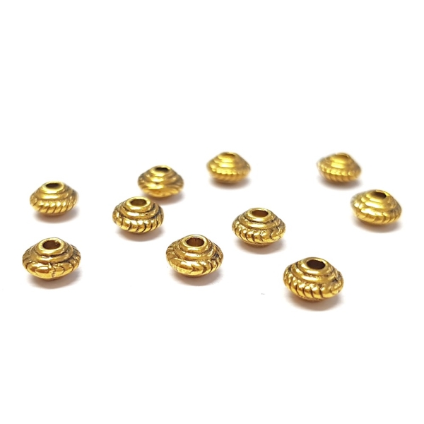 Perles métal rondes toupie 5 x 3 mm doré Doréx 50 pièces - Photo n°1