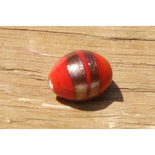 Perle en céramique ovale orange de 2 cm x 1.5 cm - Photo n°1