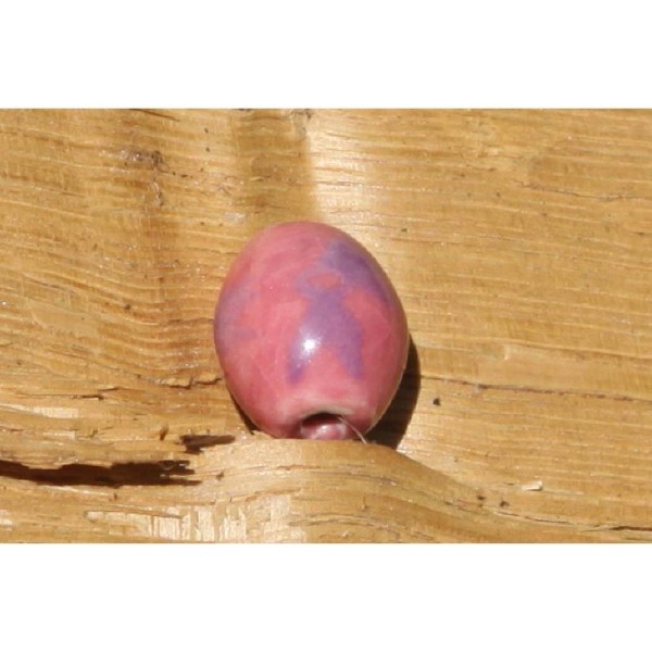 Perle en céramique ovale lilas de 1.8 cm x 1.5 cm - Photo n°1