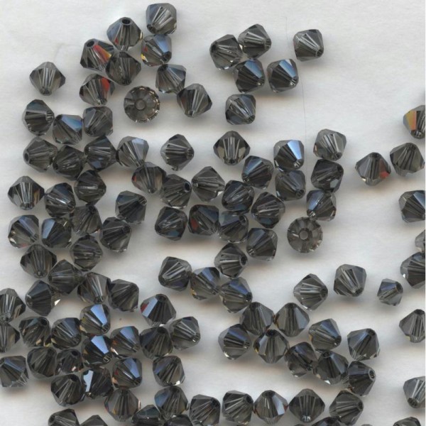 T5 5301 BDY *** 40 toupies cristal Swarovski 5mm BLACK DIAMOND SATIN - Photo n°1