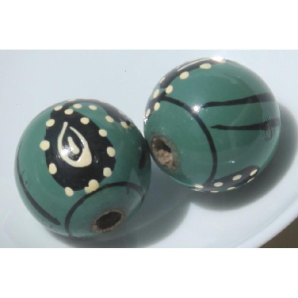 Deux perles rondes en bois bleu gris, décor peint à la main, 2 cm de diamètre. - Photo n°1