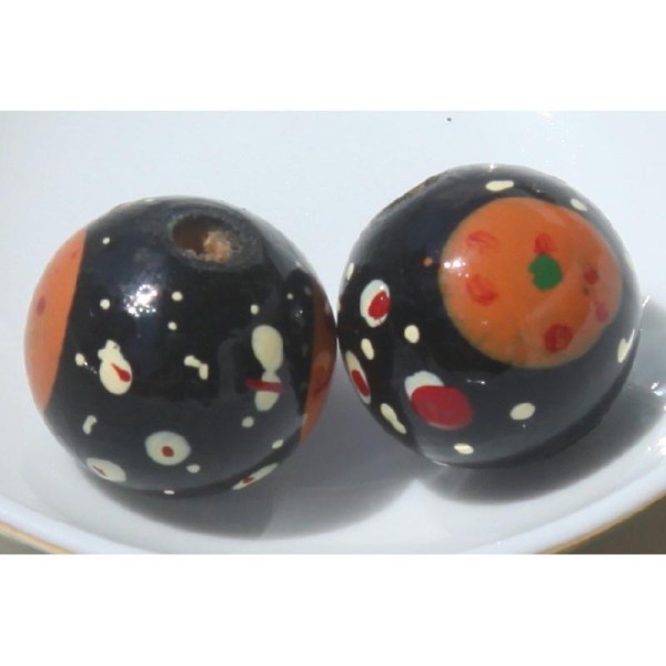 Deux perles rondes en bois noir, décor peint à la main, 2 cm de diamètre. - Photo n°1