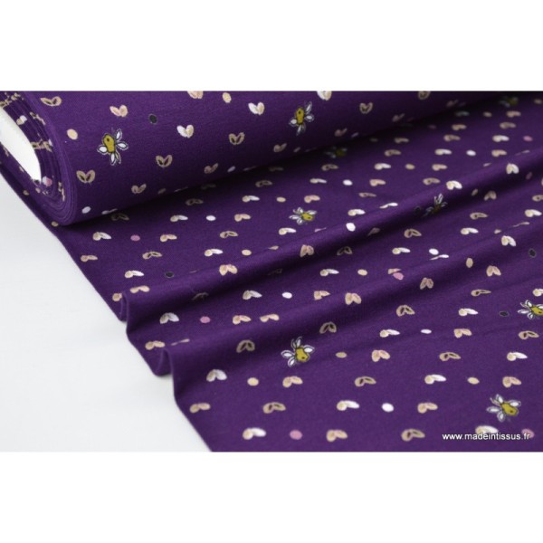Tissu jersey Viscose imprimé papillons beige sur fond violet - Photo n°1