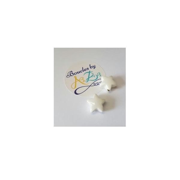 Perles étoiles blanches en céramique 15mm x2 - Photo n°1