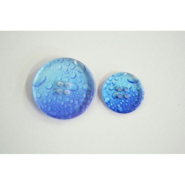 Bouton plastique goutte d'eau en transparence bleu 22mm - Photo n°1