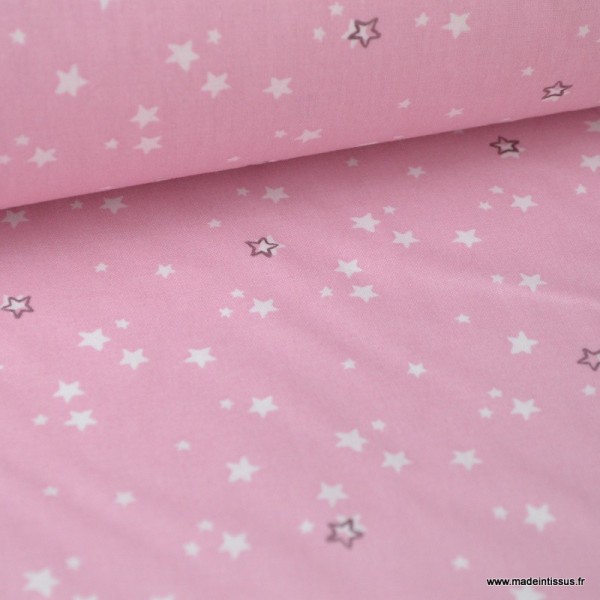 Tissu coton imprimé étoiles blanches fond rose - Photo n°1