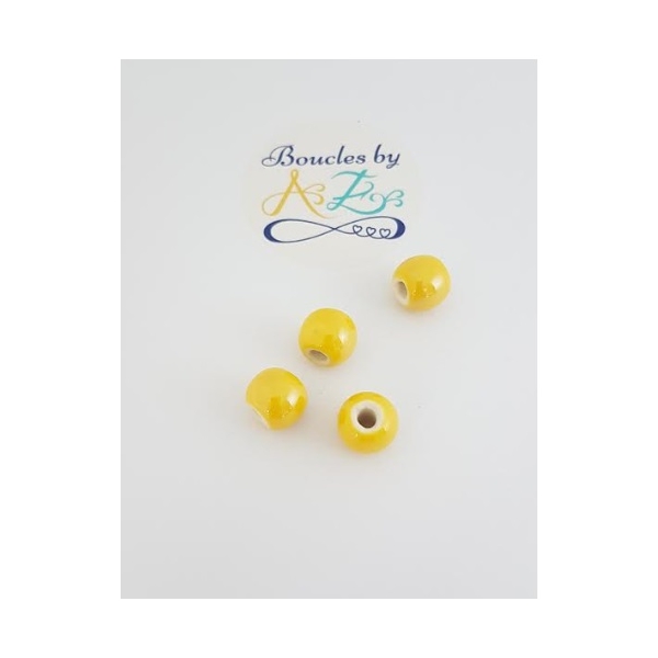 Perles rondes jaunes en céramique 10mm x2 - Photo n°1