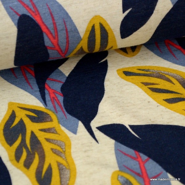 Tissu jersey Viscose imprimé feuilles bleus et moutarde fond écru chiné - Photo n°1