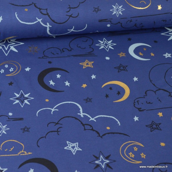 Tissu jersey Oeko tex imprimé Etoiles, lunes et nuages Or et noir fond bleu marine - Photo n°1