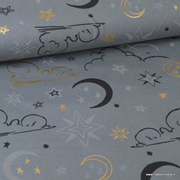 Tissu jersey Oeko tex imprimé Etoiles, lunes et nuages Or et noir fond Gris - Photo n°1