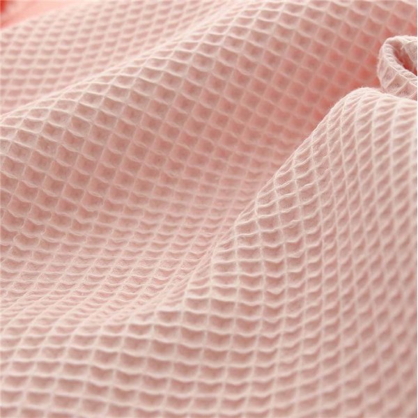 Tissu en nid d'abeille rose blush - Photo n°1