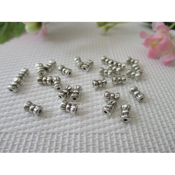 Perles métal intercalaire 6 mm nœud papillon argent mat x 100 - Photo n°1