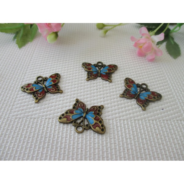 Breloques papillon bronze et émail bleu et rouge - Photo n°1