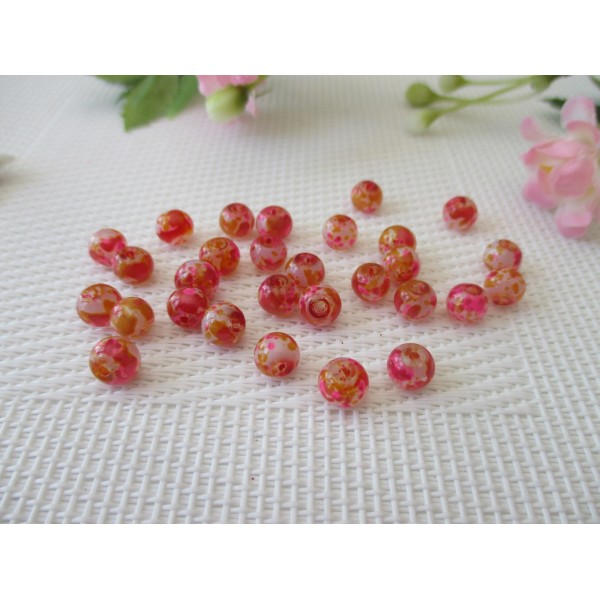 Perles en verre 6 mm taches oranges et roses x 25 - Photo n°1