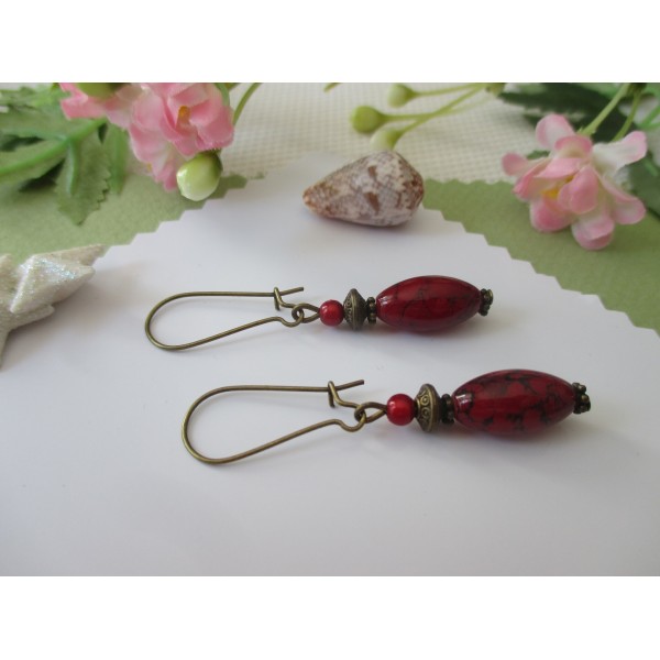 Kit de boucles d'oreilles apprêts bronzes et perle olive en verre rouge - Photo n°1