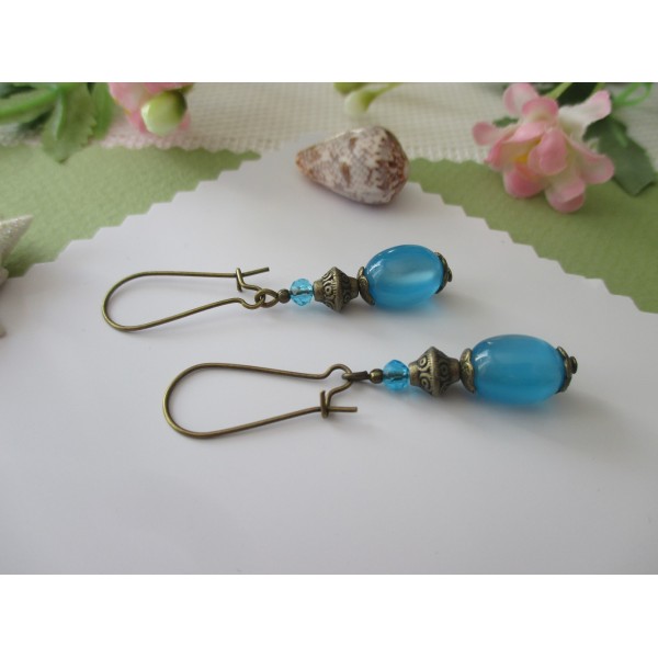 Kit de boucles d'oreilles apprêts bronze et perle en verre bleue - Photo n°1