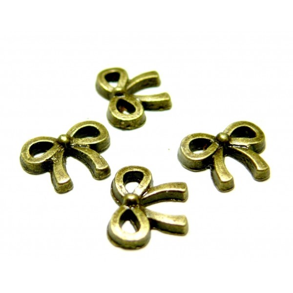 Lot de 40 petits noeuds métal couleur Bronze ref 22 - Photo n°1