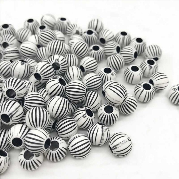 LOT 25 PERLES ACRYLIQUES : rondes fantaisies blanches/noires 9mm (01) - Photo n°1