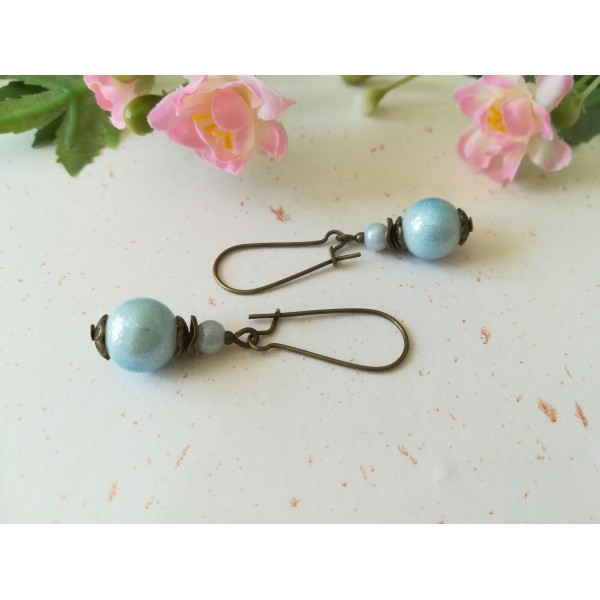 Kit boucles d'oreilles apprêts bronzes et perles en verre bleue - Photo n°1
