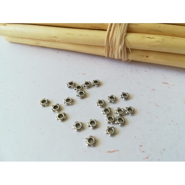 Perles métal intercalaires fleur 4 mm argent mat x 50 - Photo n°1
