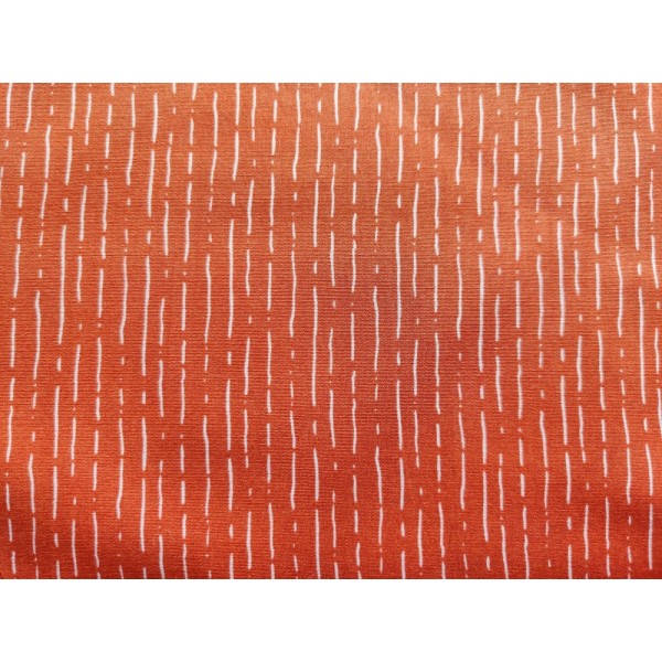 Tissu STENZO popeline de coton - graphique blanc sur fond rouille - Photo n°1