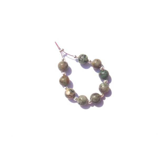 Turquoise Africaine : lot 9 perles assorties 7 MM de diamètre - Photo n°1