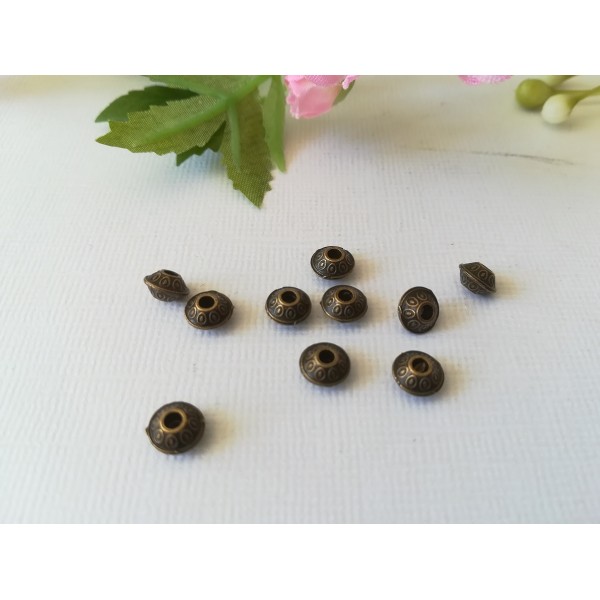 Perles métal toupie 6 mm bronze x 26 - Photo n°1