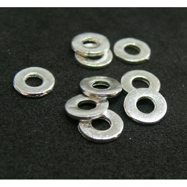 PS110082743 PAX 100 perles intercalaires Rondelles 7 par 1mm métal couleur Argent Vif - Photo n°2