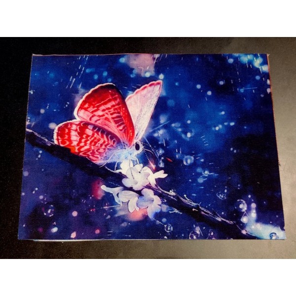 Coupon tissu - papillon sur une fleur , ton bleu - coton épais - 20x15cm - Photo n°1
