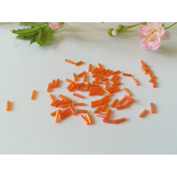 Rocailles tubes 6 mm orange à reflets x 10 gr (environ 300 perles ) - Photo n°1