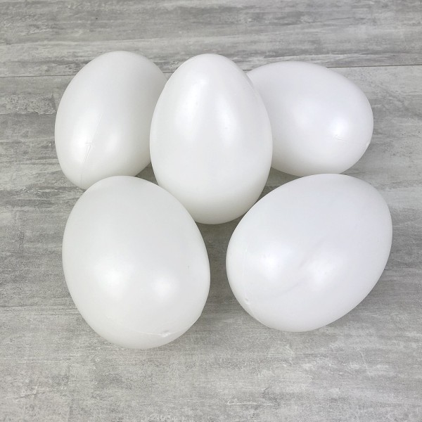 Lot 5 grands Oeufs en plastique blanc, haut. 12 cm, avec trou de suspension, non séparables, à décor - Photo n°1