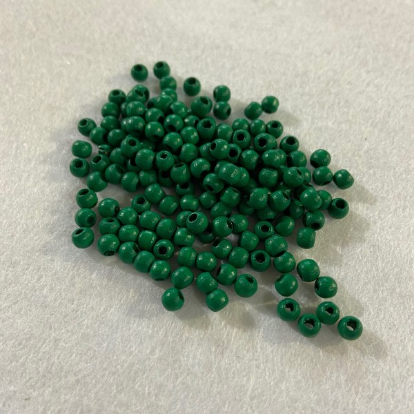 Perles en bois vert - Photo n°1
