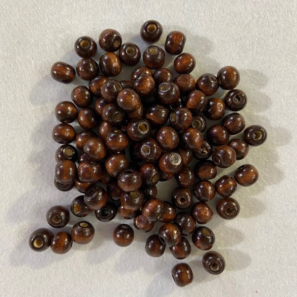 Perles en bois marron - Photo n°1