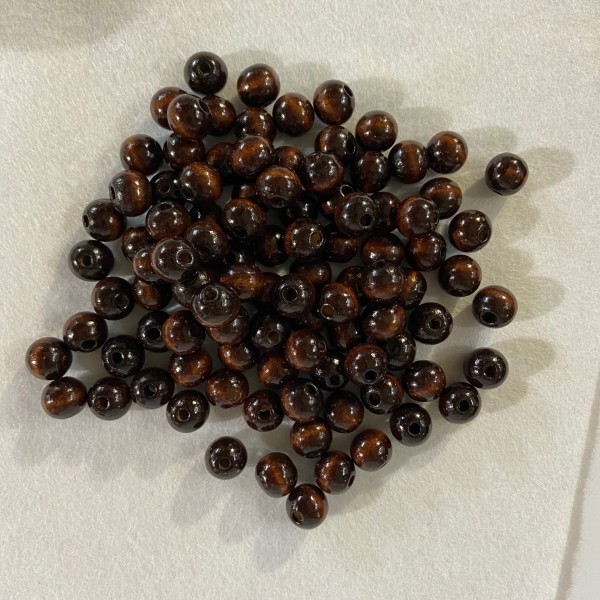 Perles en bois marron foncé - Photo n°1