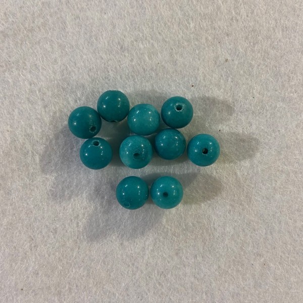 Dix Perles en résine bleu turquoise - Photo n°1
