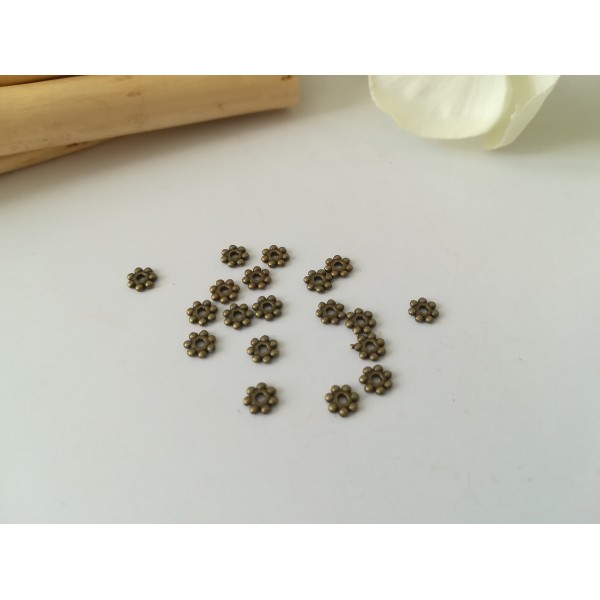 Perles métal intercalaires fleur 4.5 mm bronze x 50 - Photo n°1